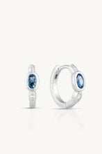 Load image into Gallery viewer, London Blue Topaz Textured Silver Huggies
